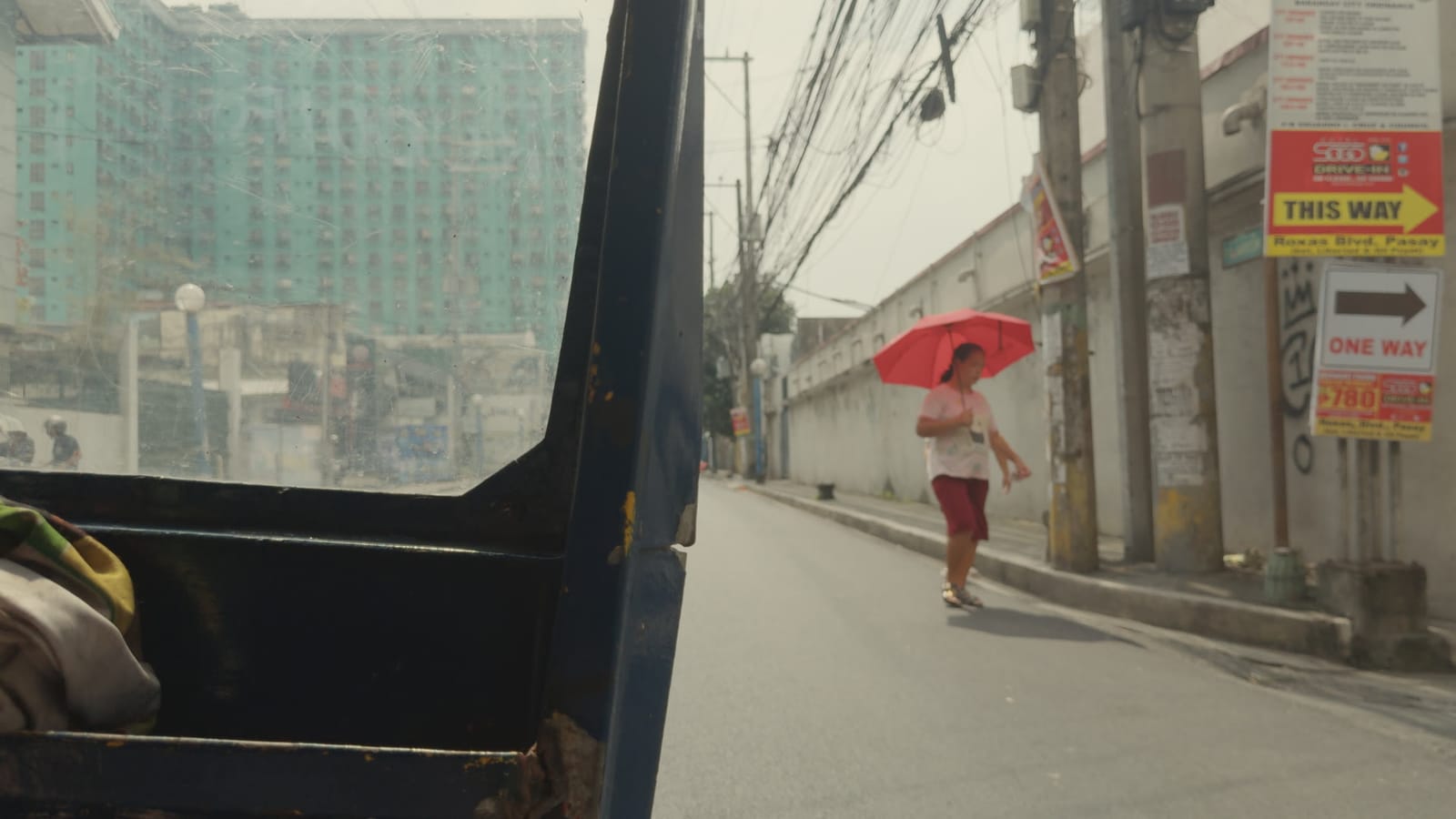 After Dark, My Sweet, applied to log footage of a street in Manila