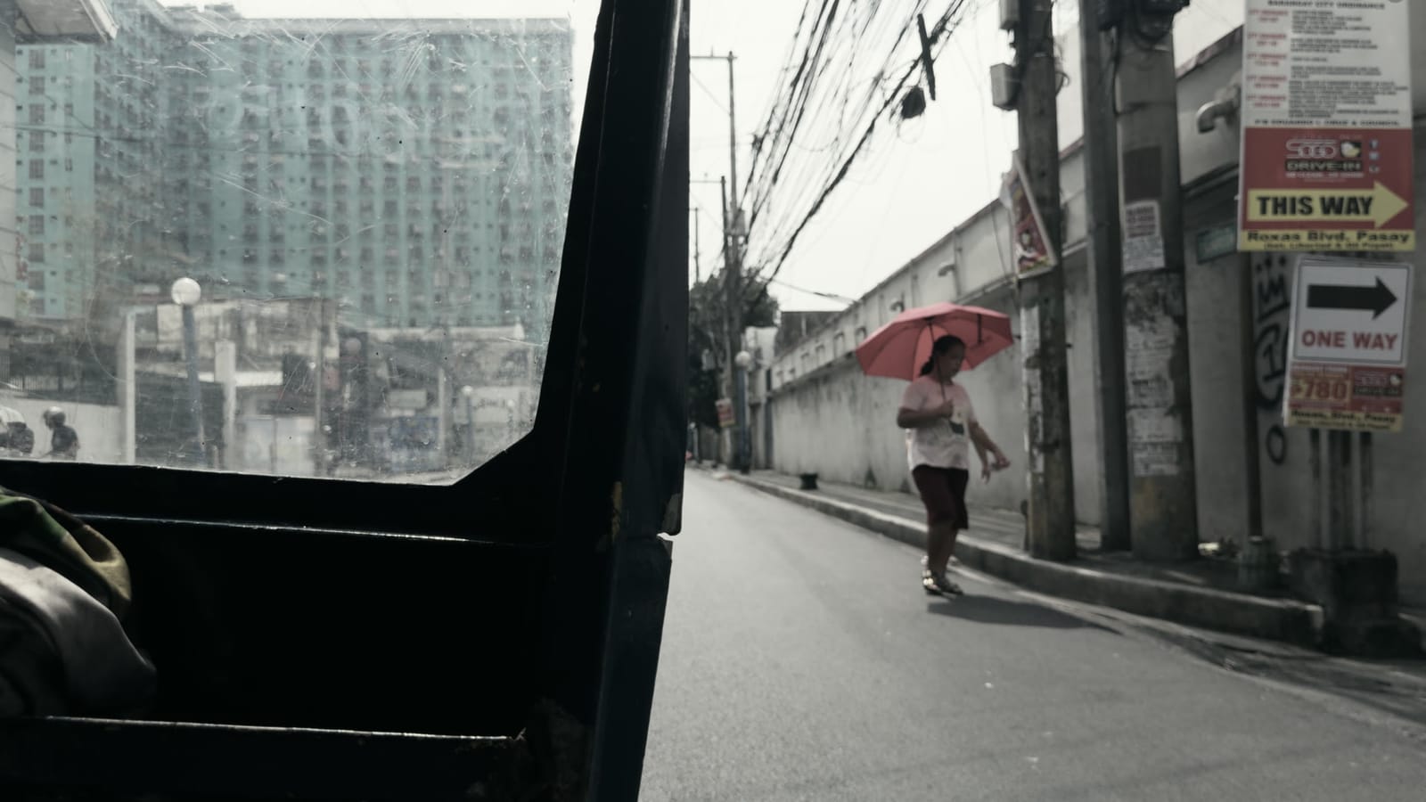 Bleach Bypass, applied to log footage of a street in Manila