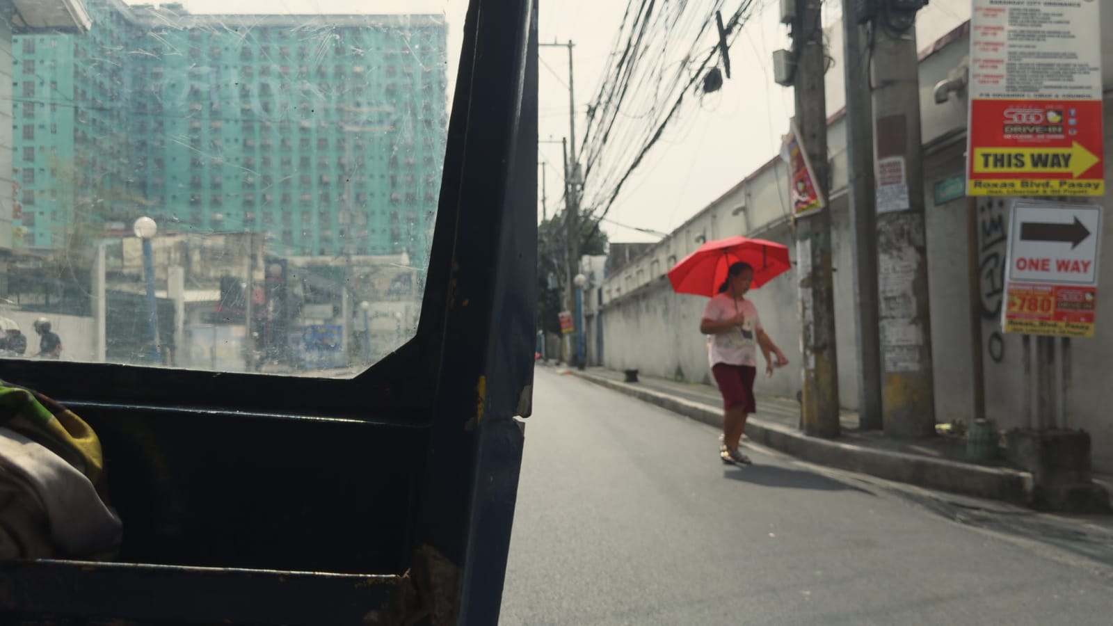 Everybody Knows, applied to log footage of a street in Manila