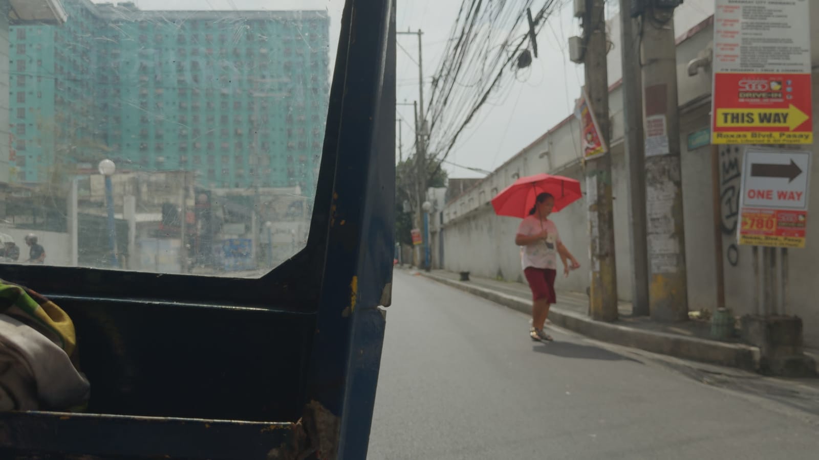 Fighting, applied to log footage of a street in Manila