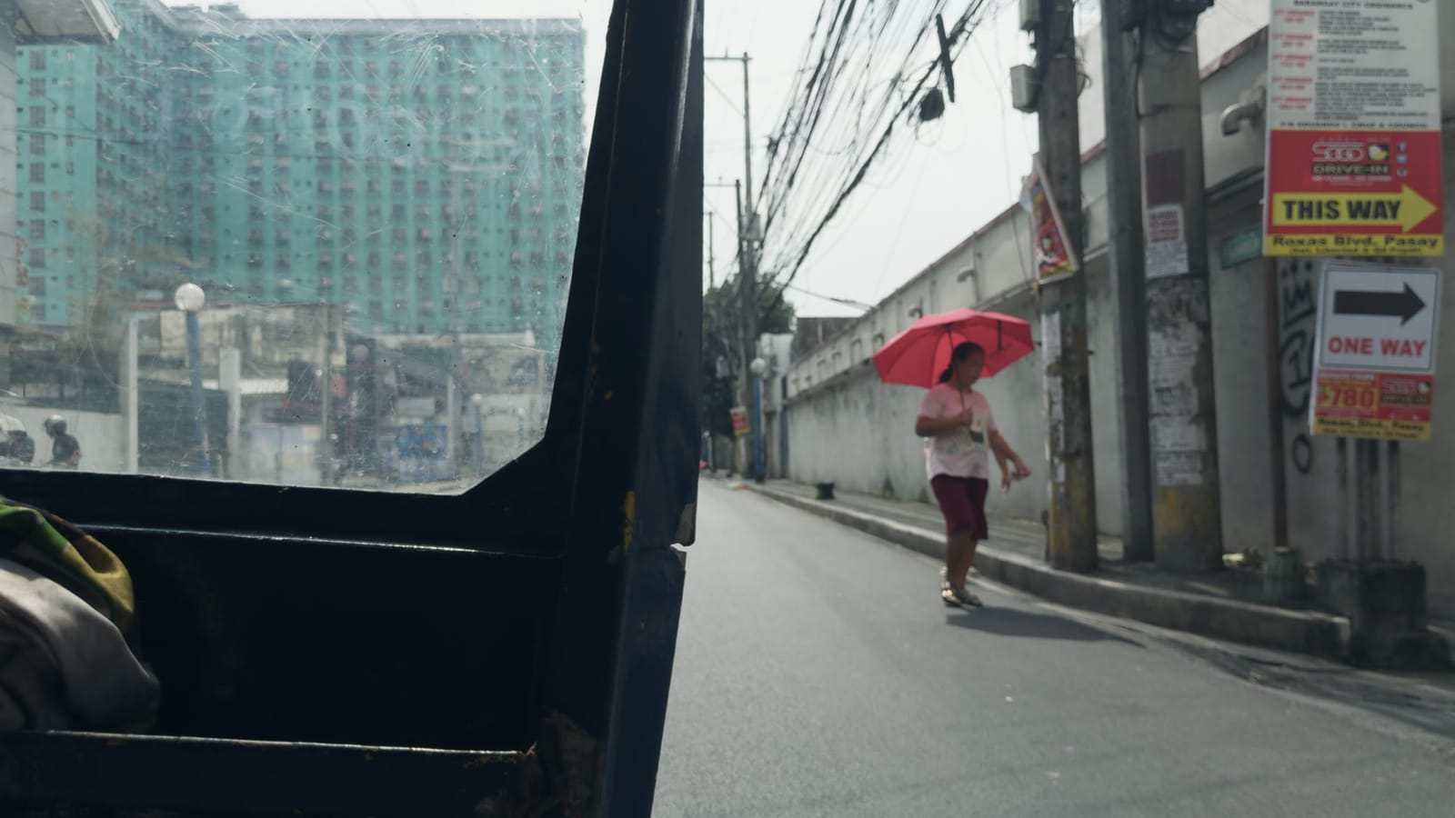 I Origins, applied to log footage of a street in Manila