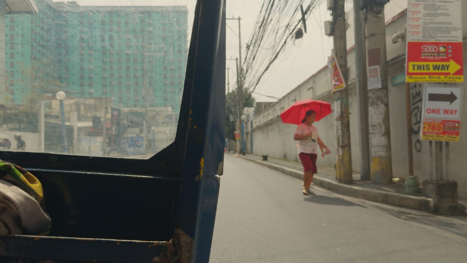 Lords of Dogtown, applied to log footage of a street in Manila