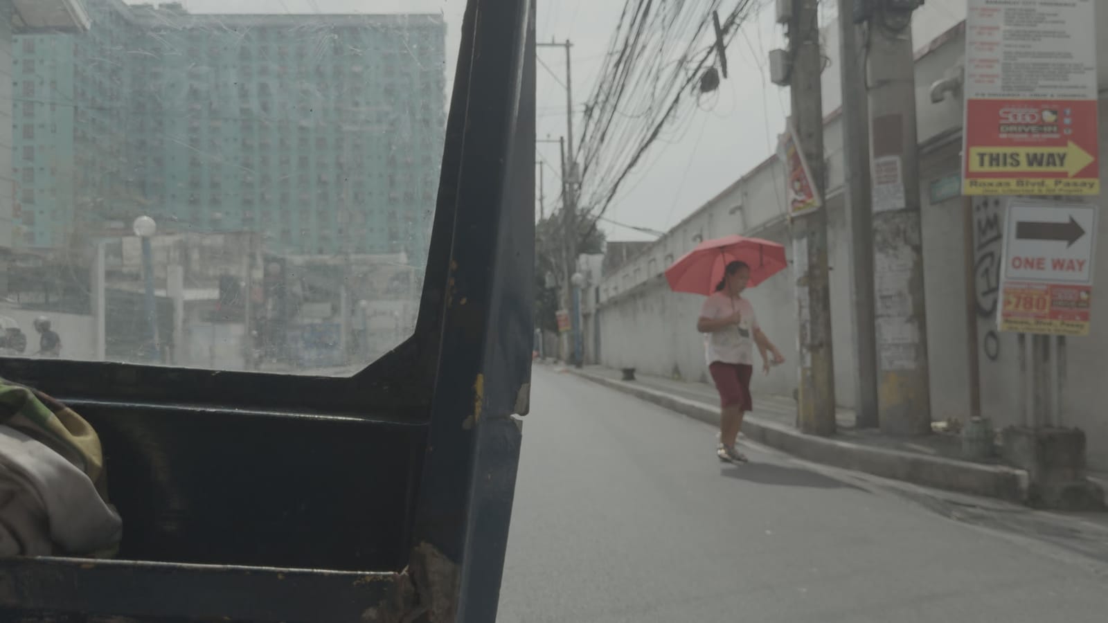 Monster, applied to log footage of a street in Manila