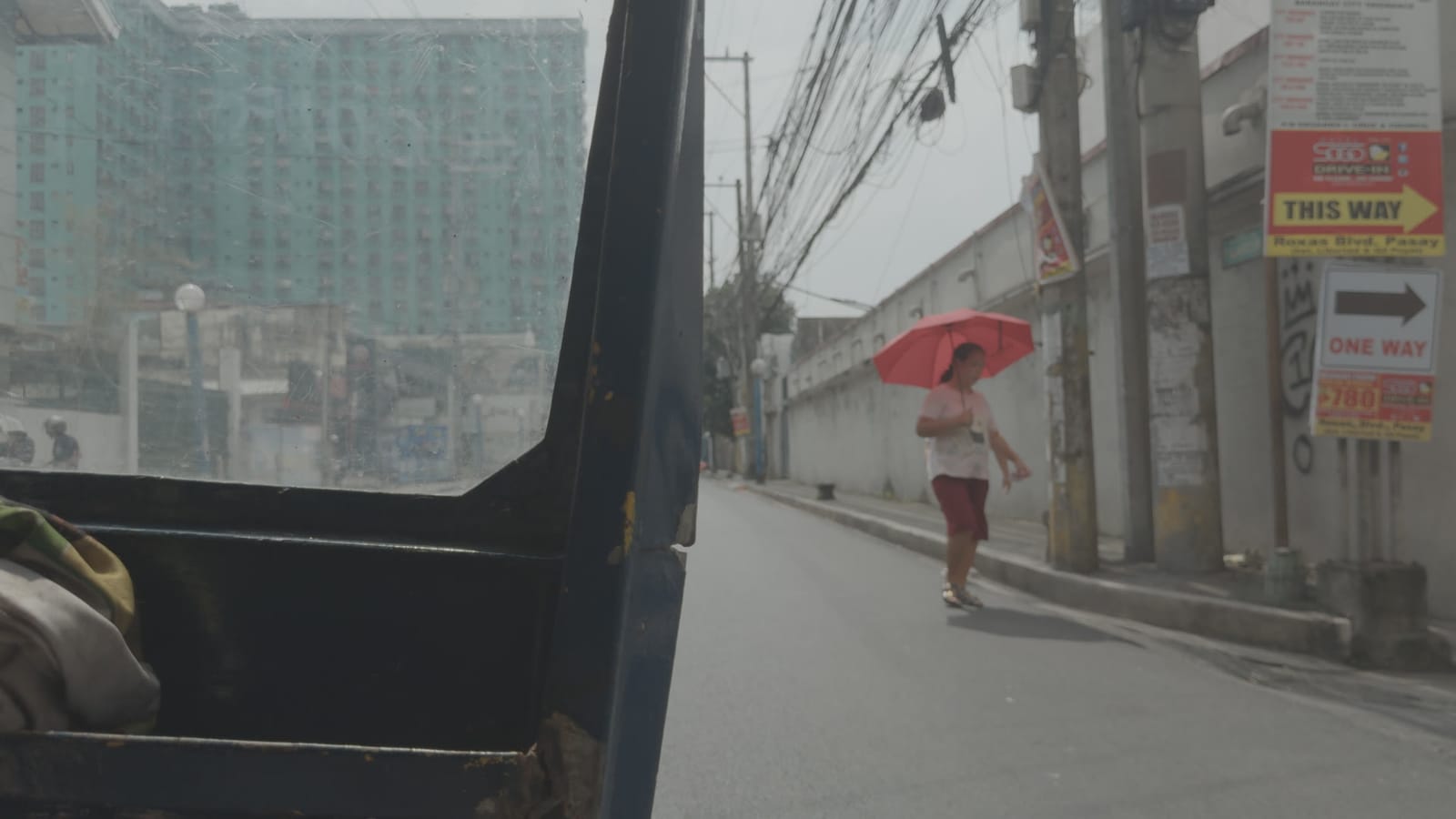 Nitram, applied to log footage of a street in Manila
