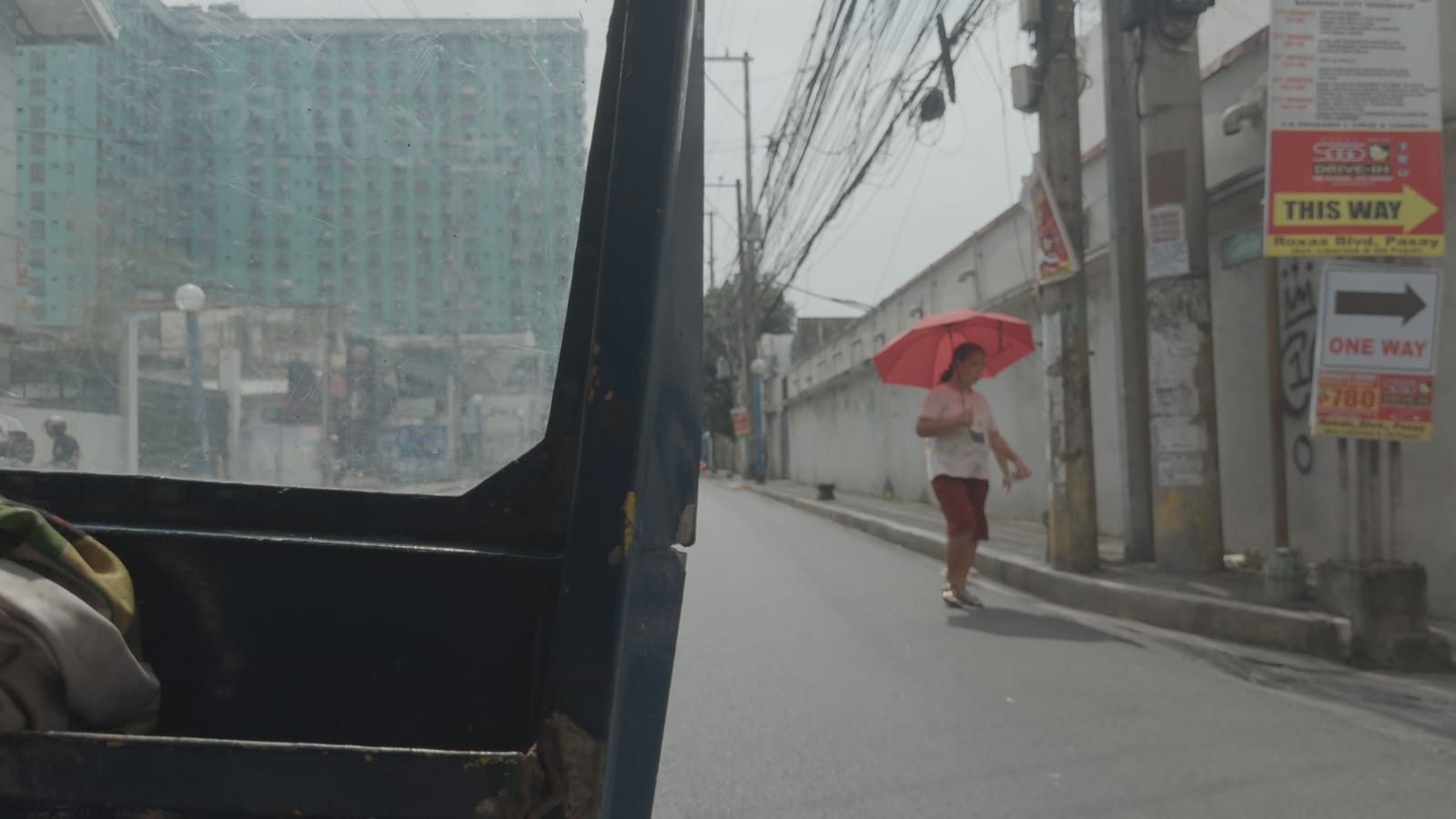 Oslo, August 31st, applied to log footage of a street in Manila