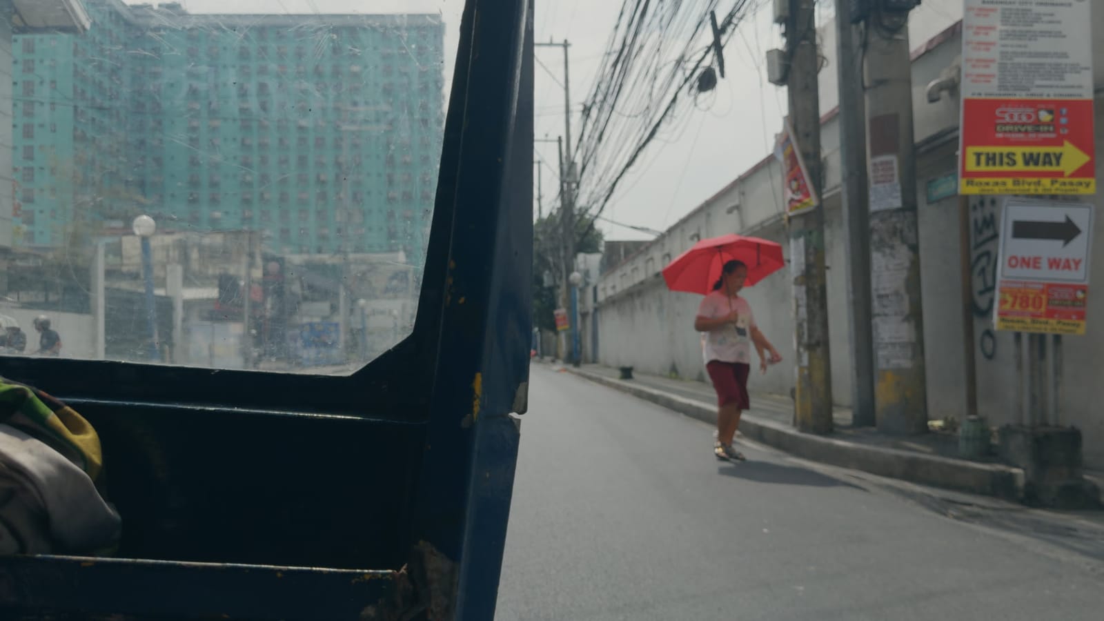 Phone Booth, applied to log footage of a street in Manila