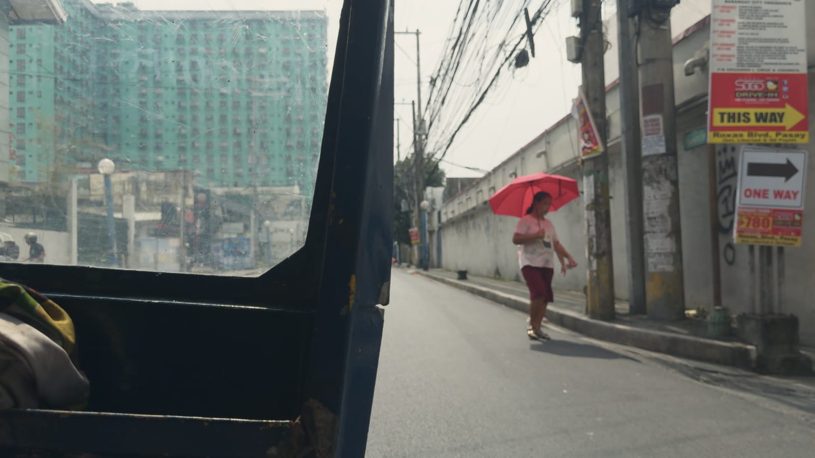 Portra Glow, applied to log footage of a street in Manila