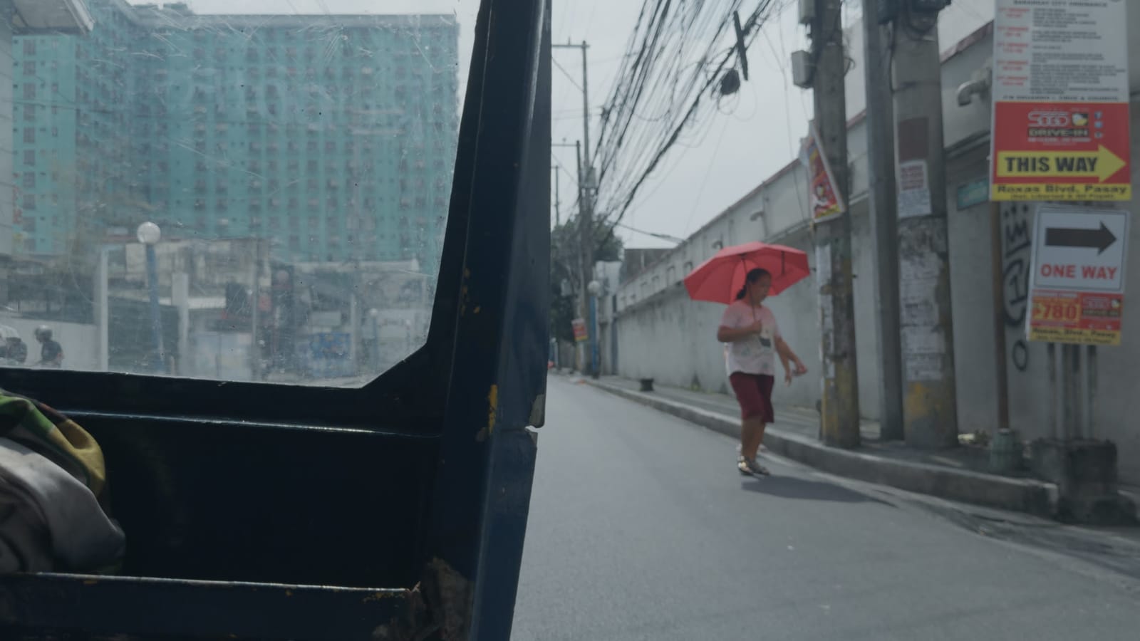 Stay, applied to log footage of a street in Manila