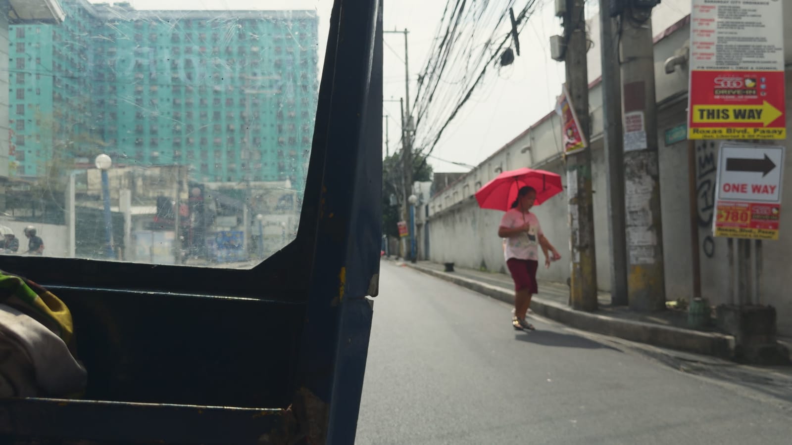 The Honest Candidate, applied to log footage of a street in Manila