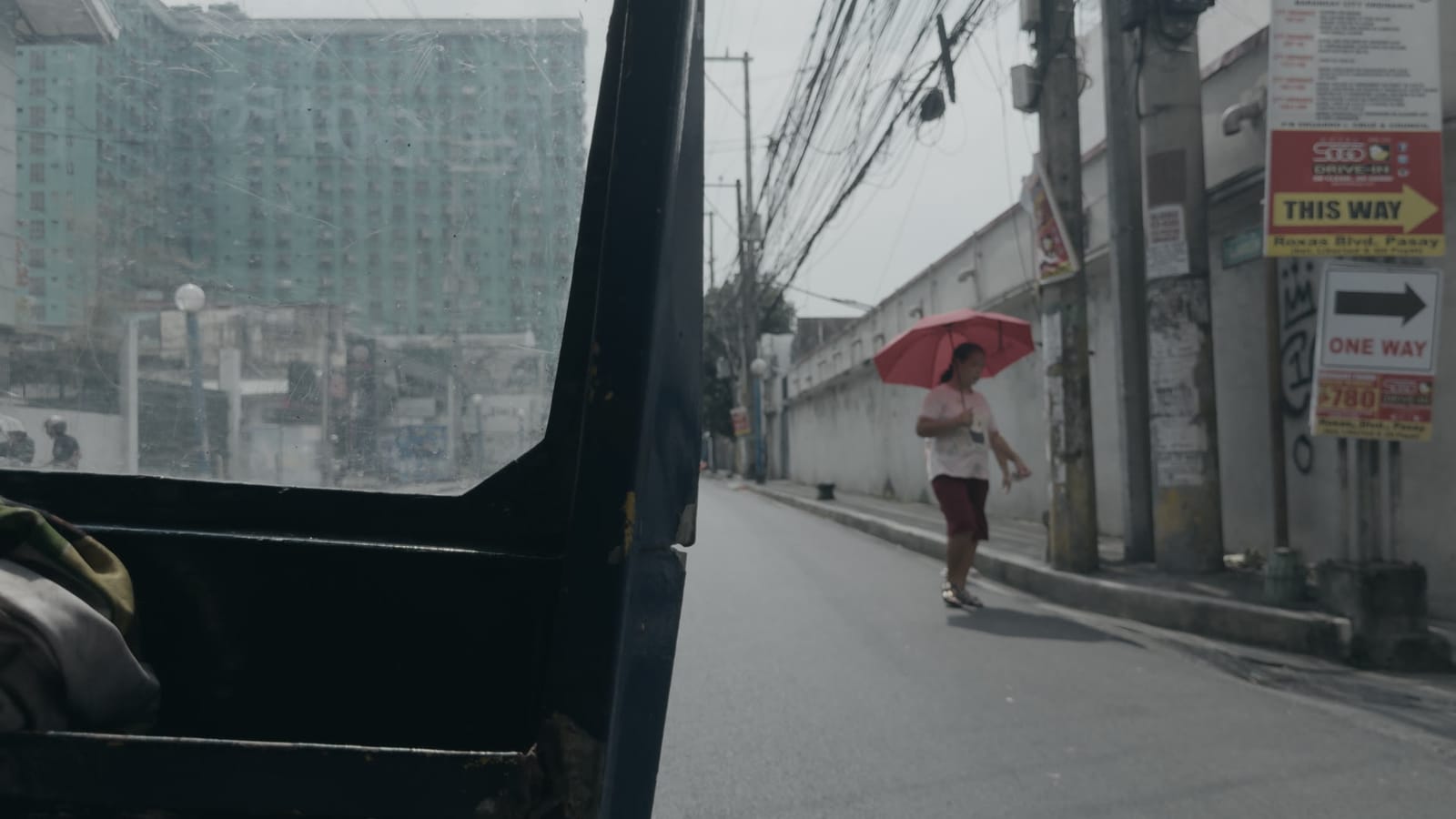 The Return, applied to log footage of a street in Manila