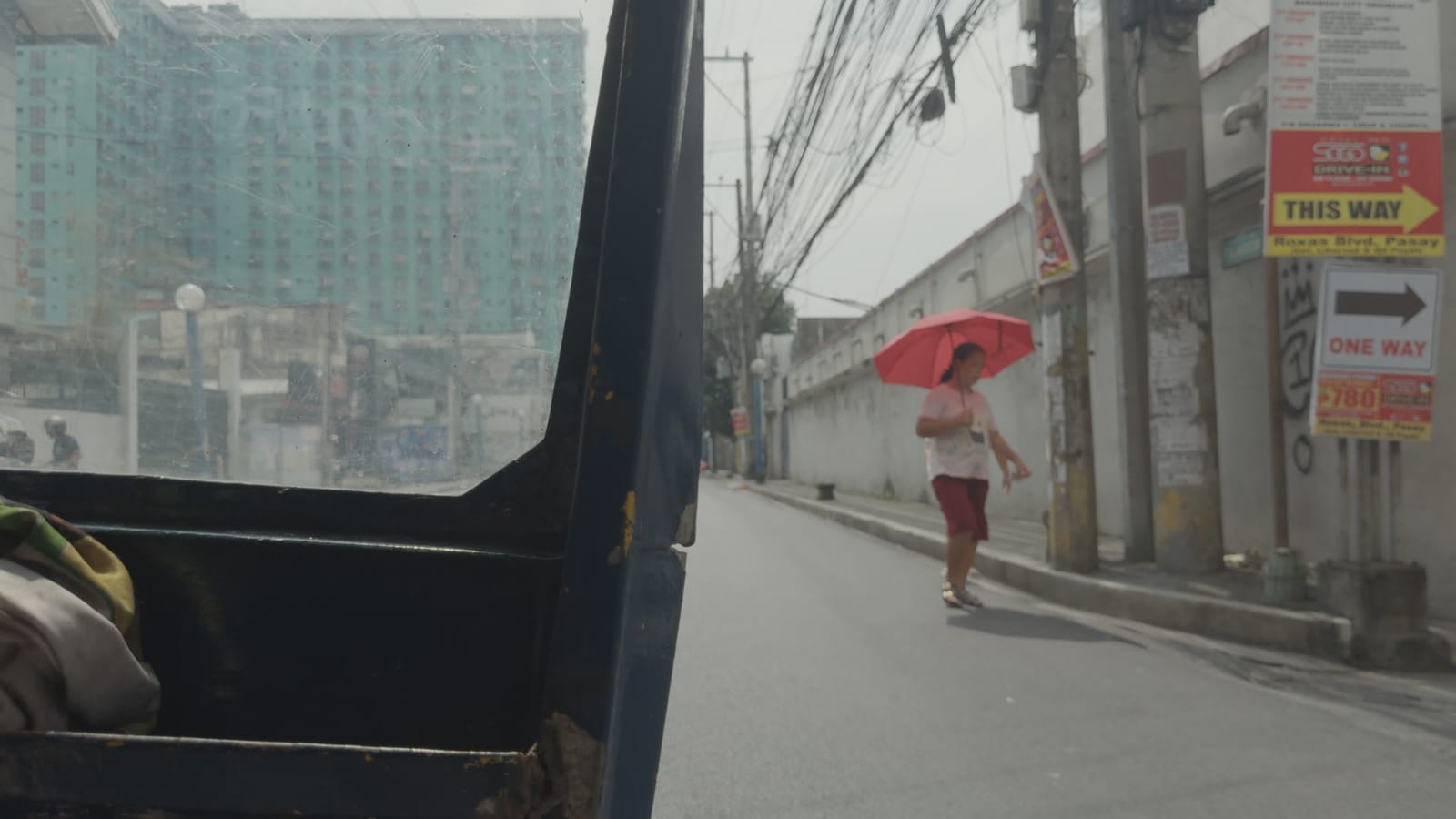 The State I Am In, applied to log footage of a street in Manila