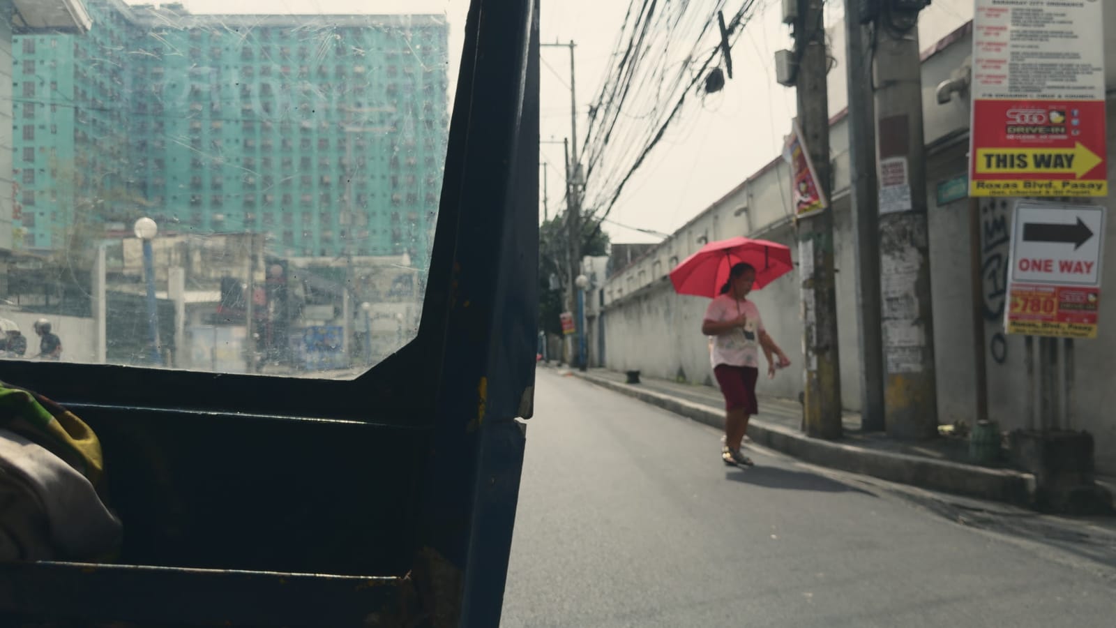 The Tribes of Palos Verdes, applied to log footage of a street in Manila