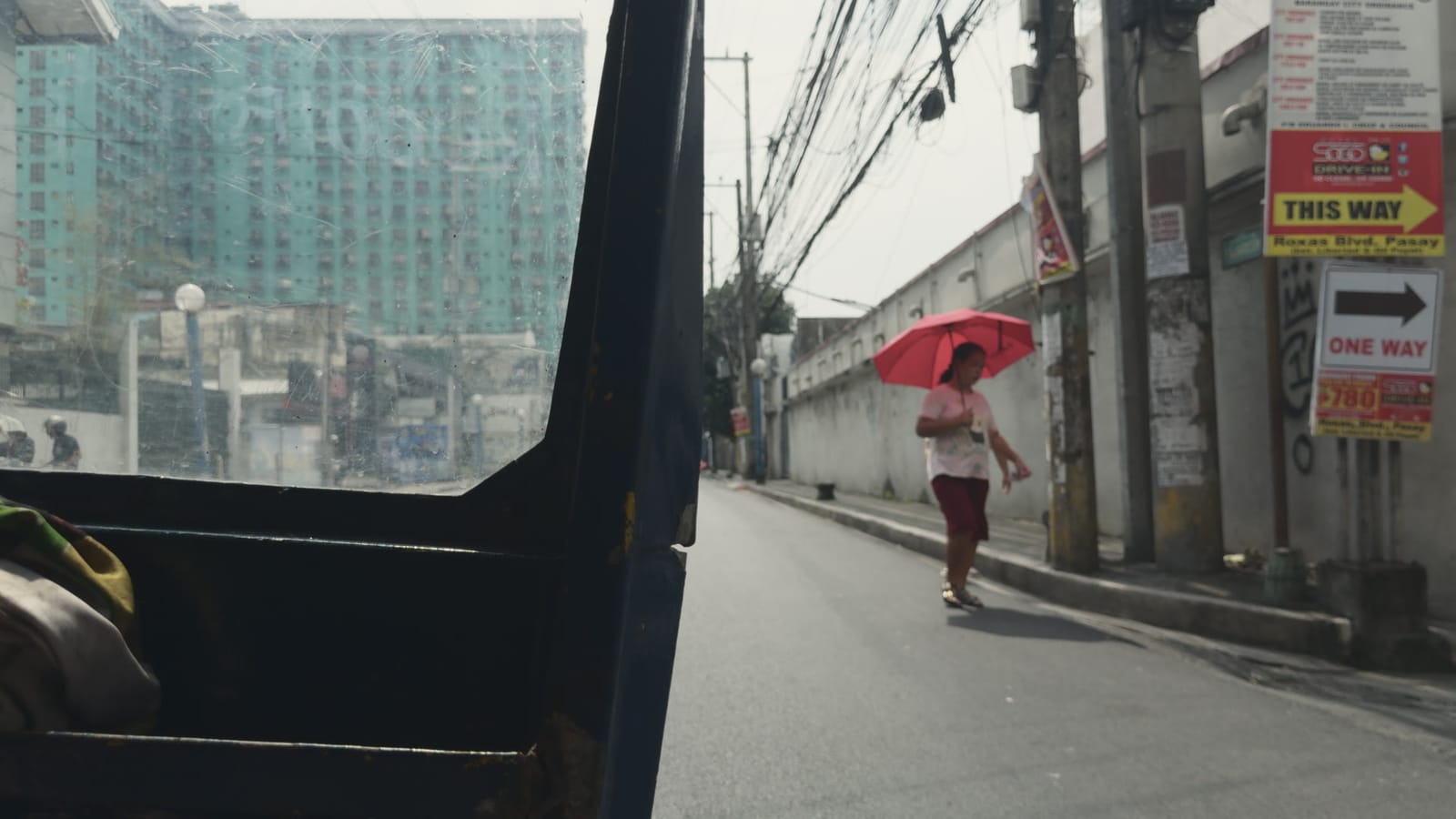 Tomboy, applied to log footage of a street in Manila