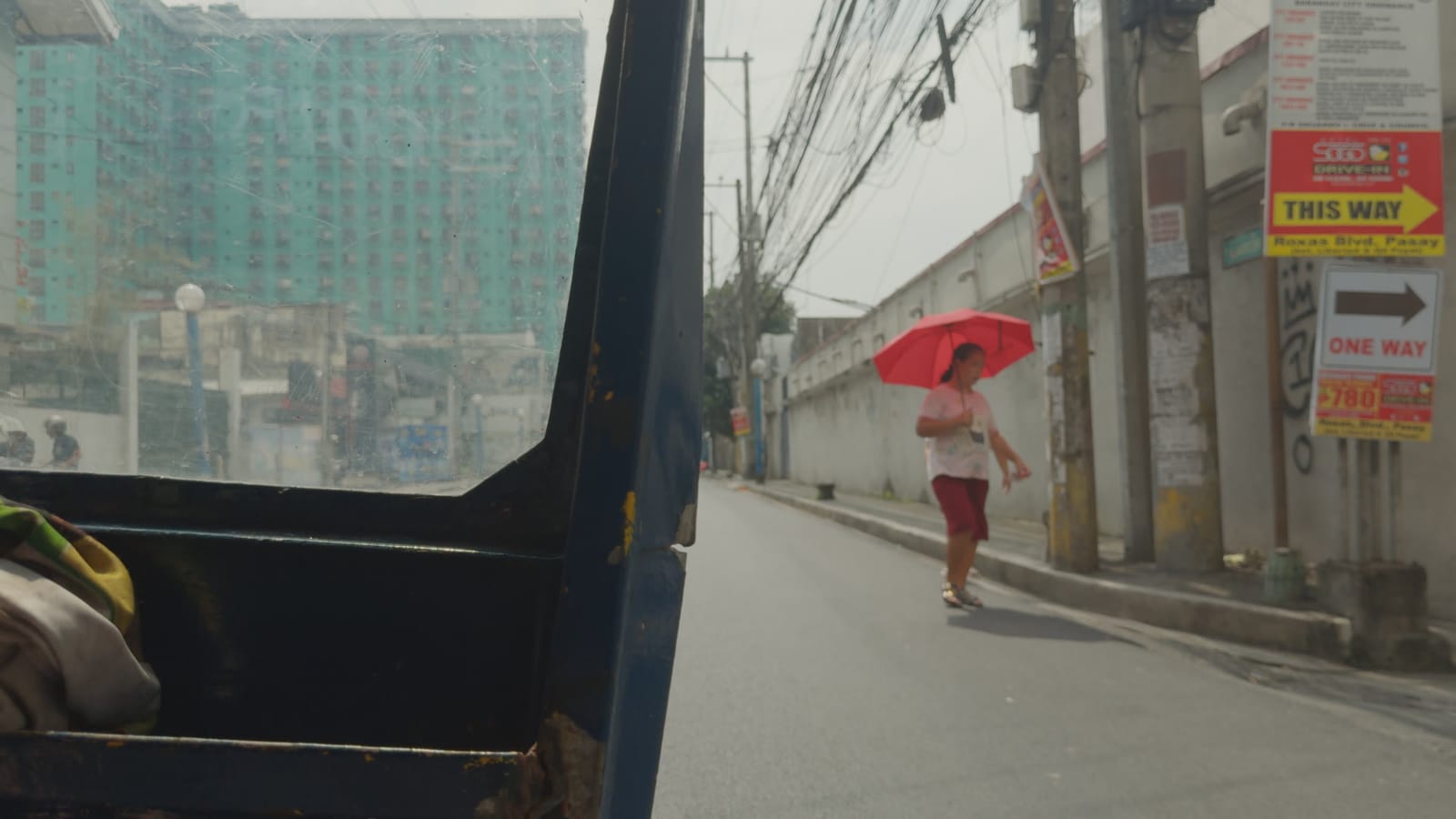 Y Tu Mamá También, applied to log footage of a street in Manila