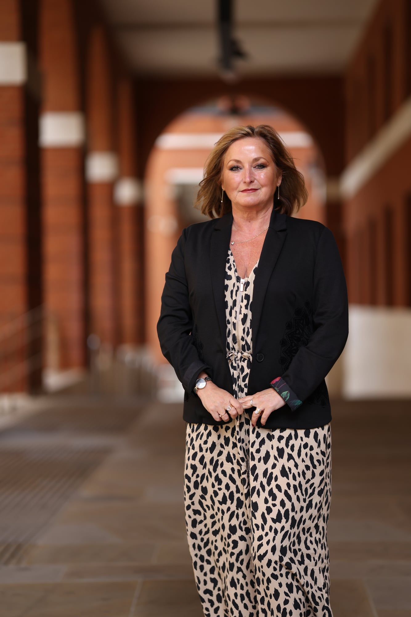 Business portraits: In a brick colonnade