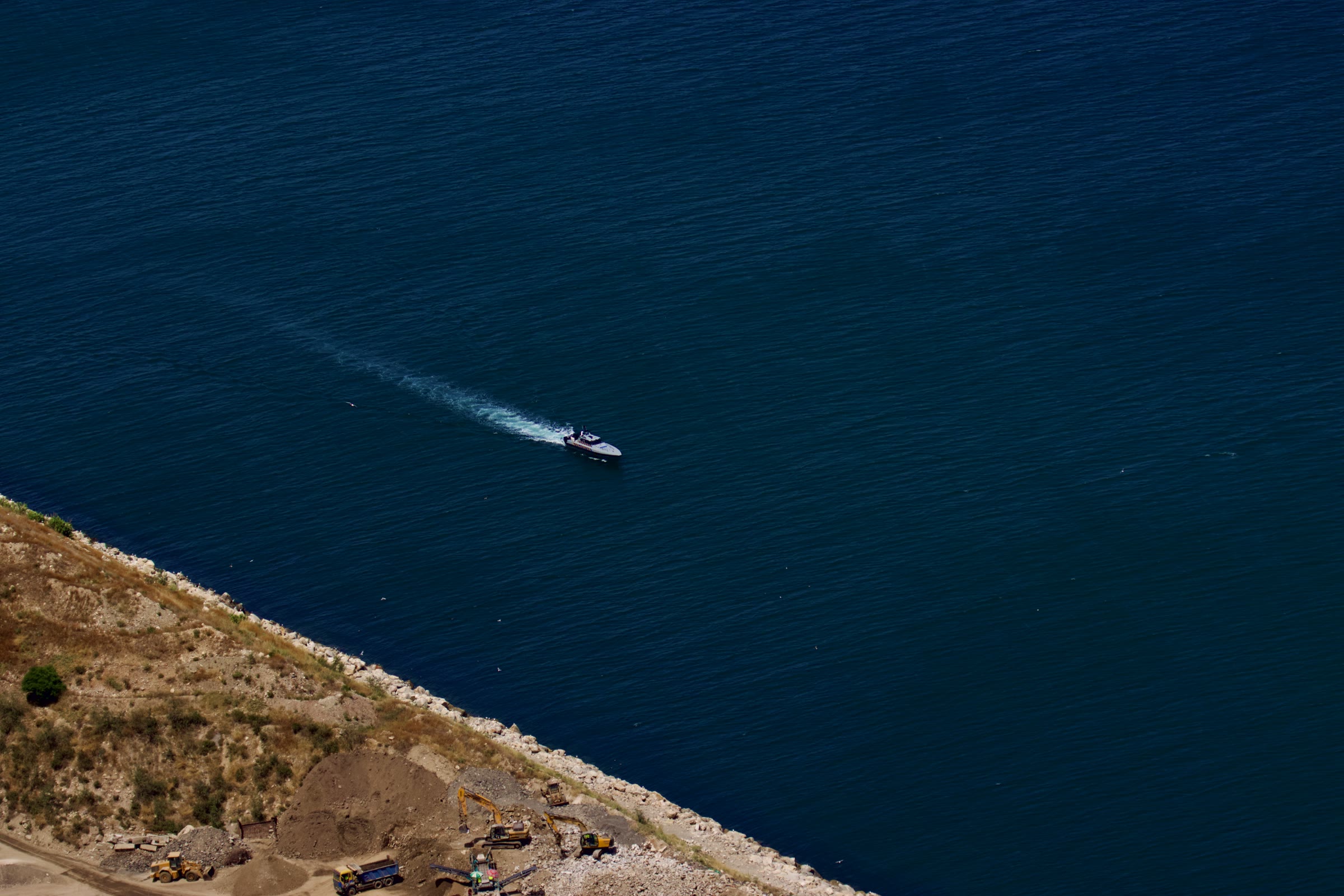 Gibraltar from above: One boat on deep blue water
