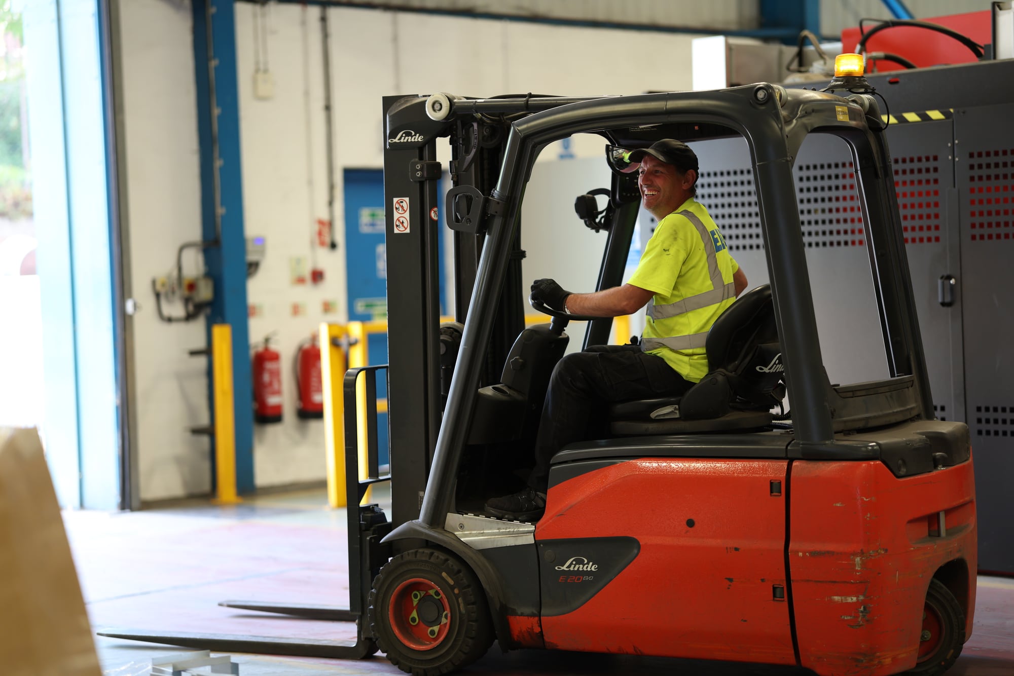 Industry & manufacturing: A forklift driver in the loading bay
