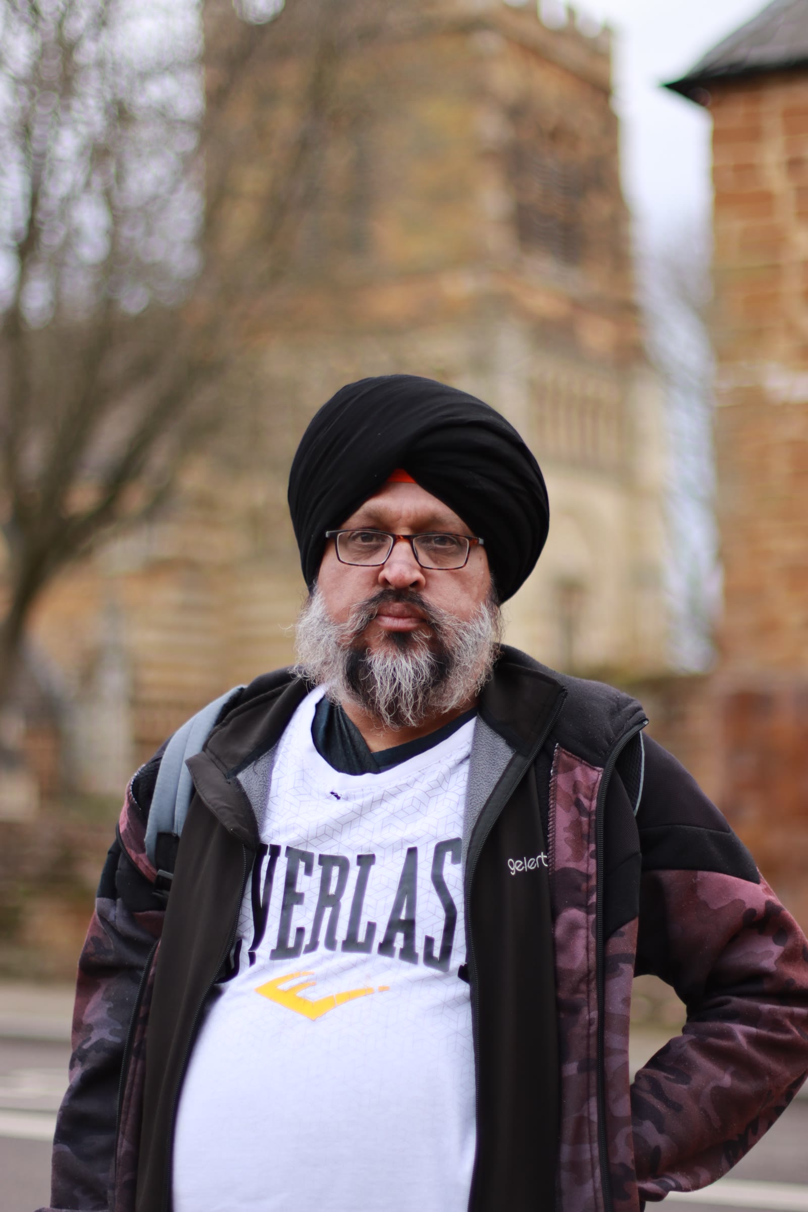 UK street portraits: Northampton, the church tower behind