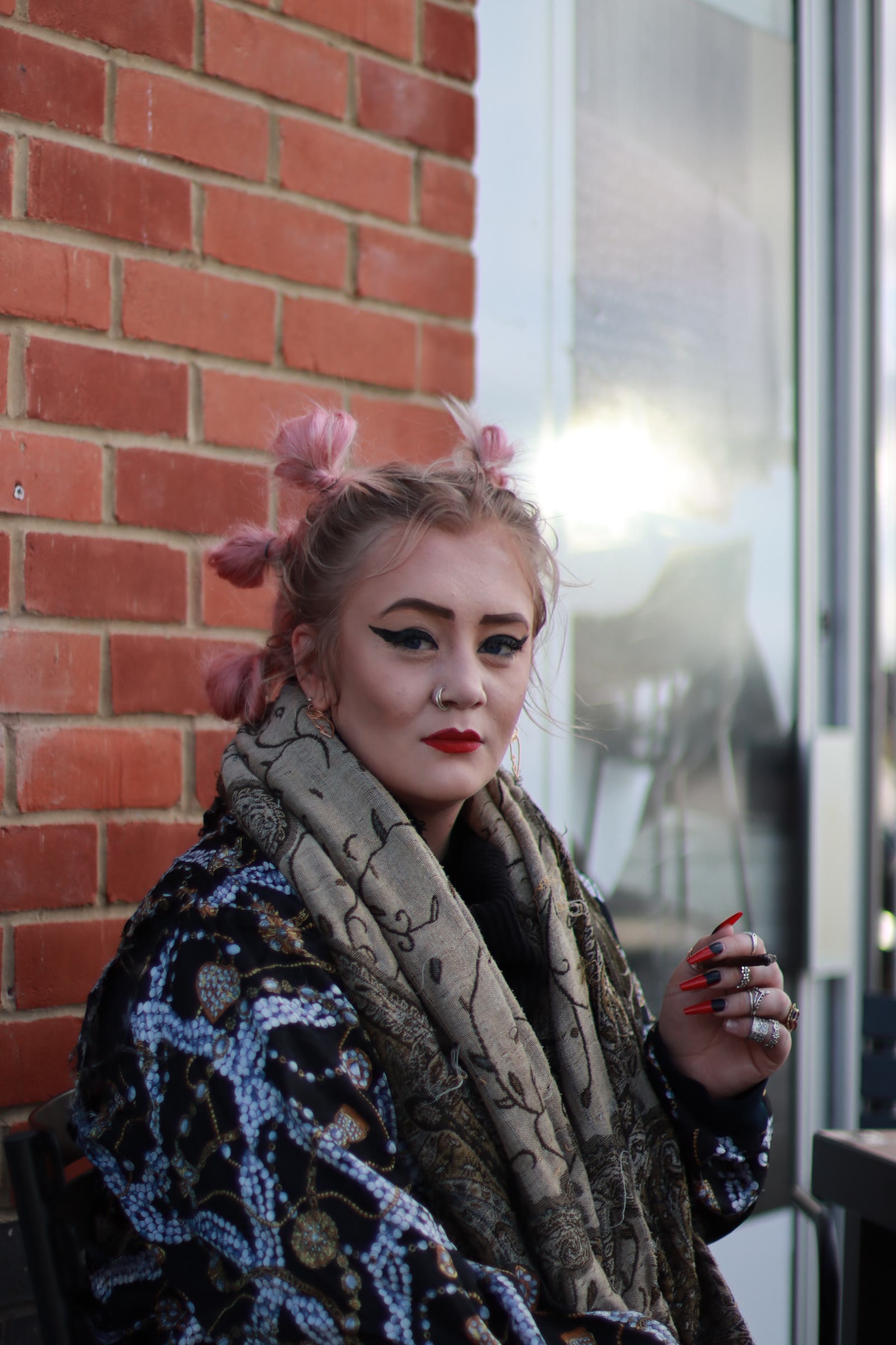 UK street portraits: Gloucester, against the brick