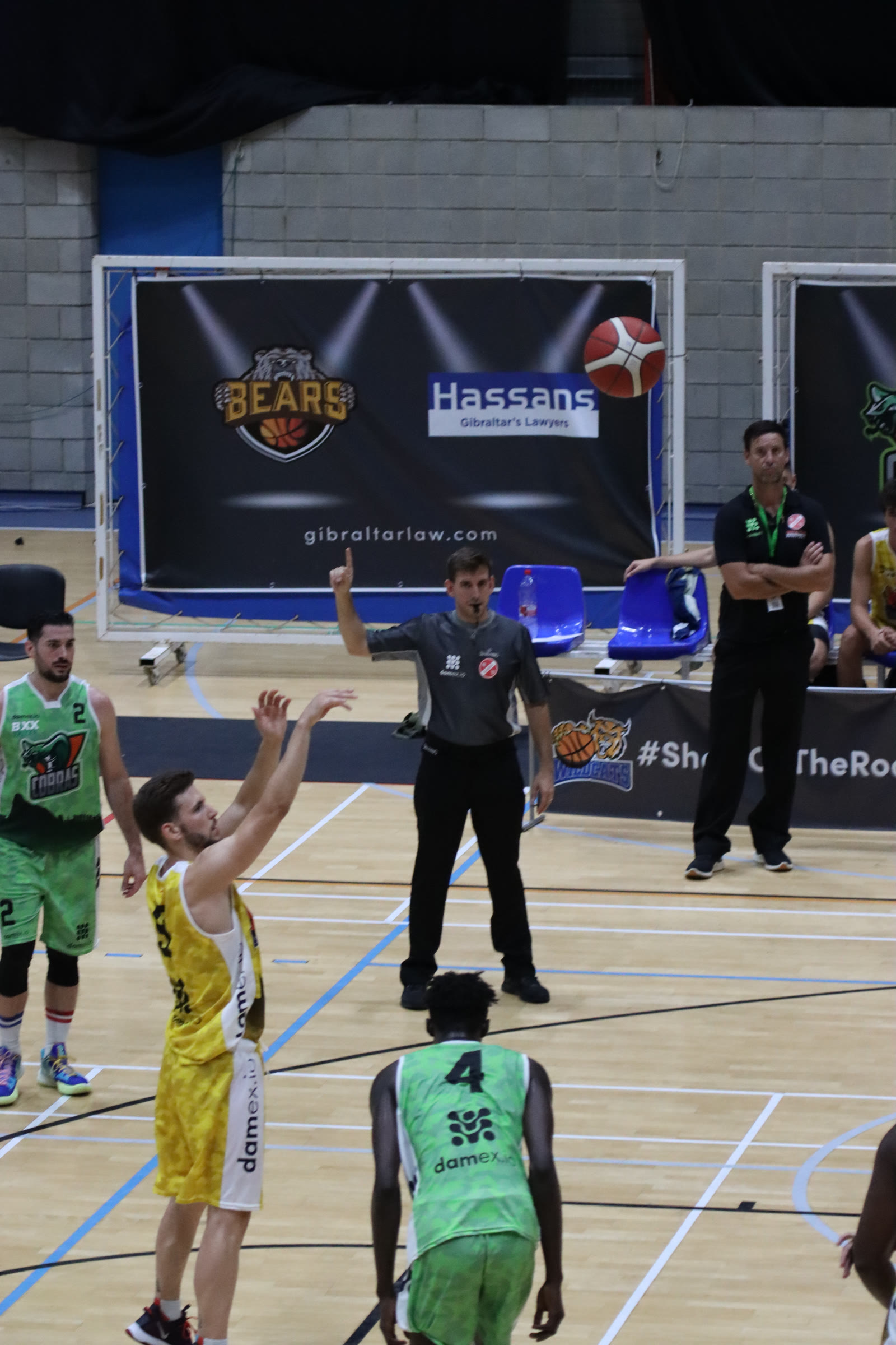A free throw, ball in the air